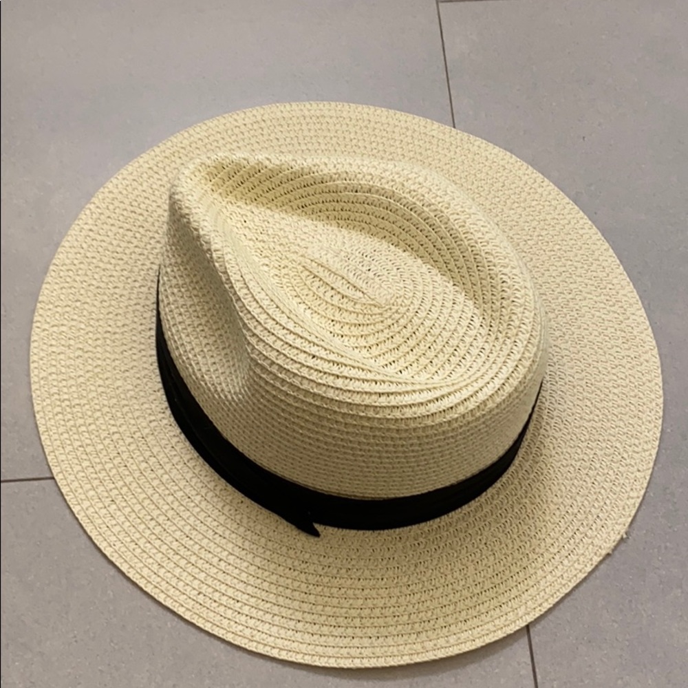 White and black straw hat. Panama style